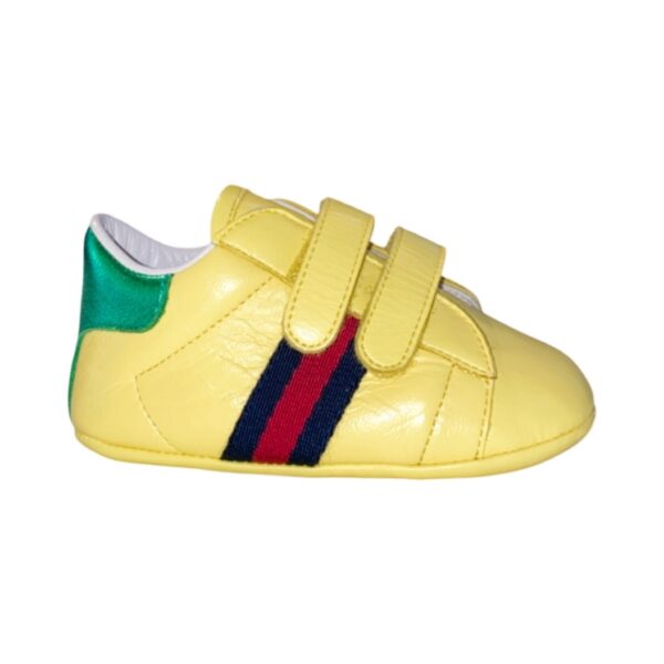 Gucci - Scarpa gialla logata con strappo